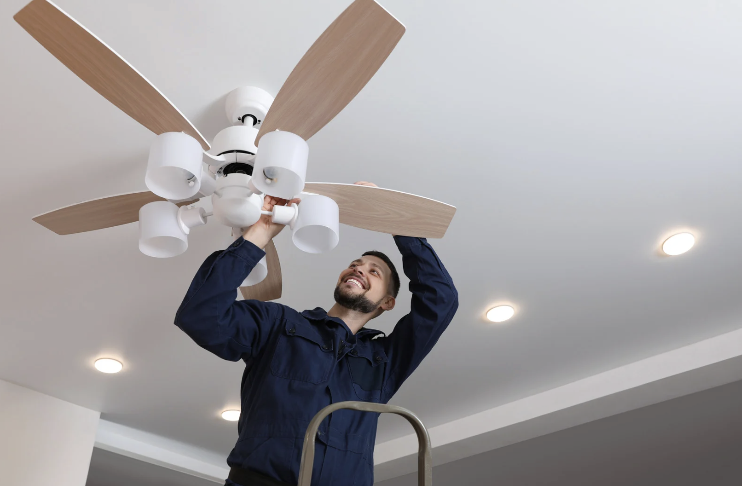Professional ceiling fan installation in a modern home